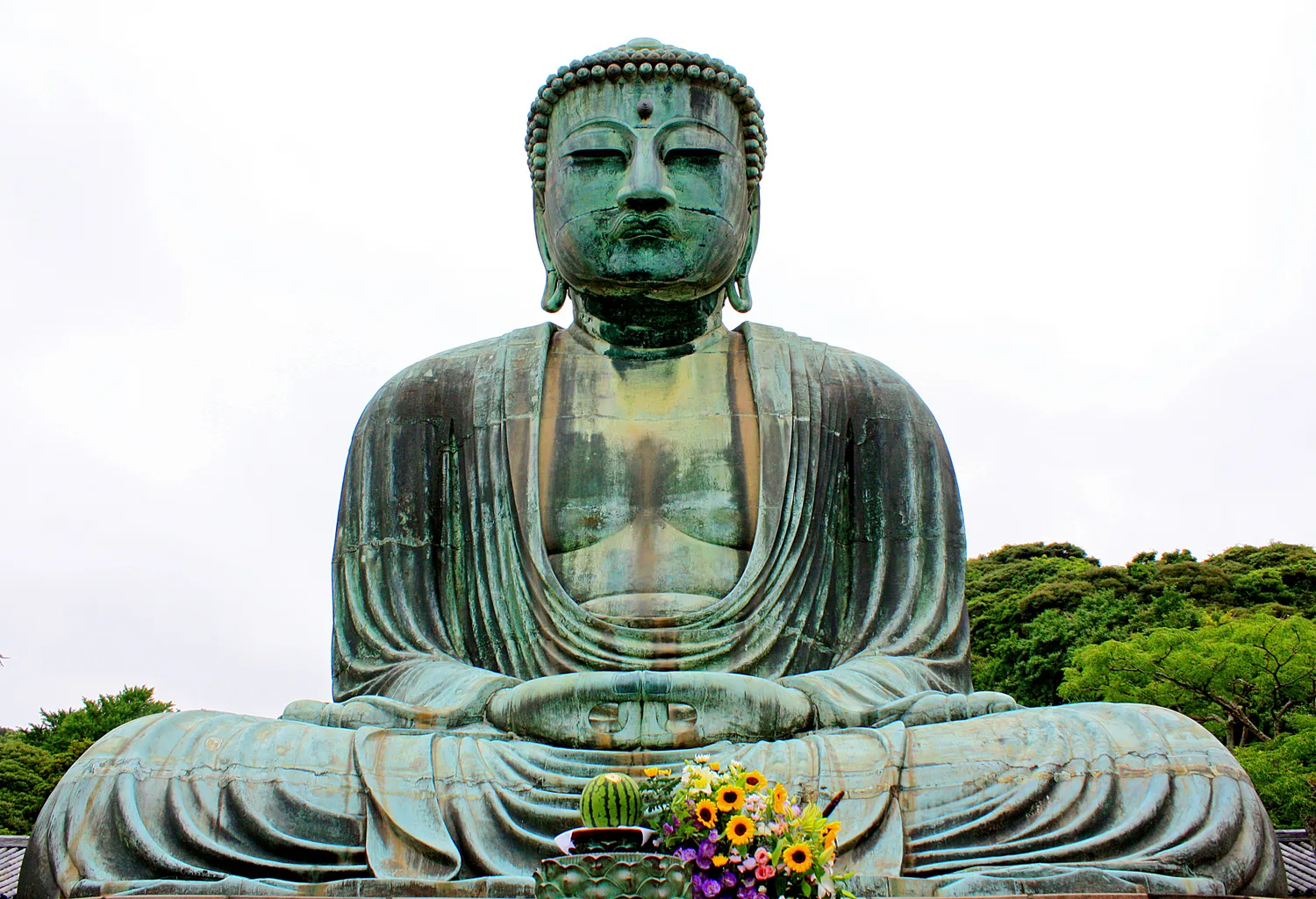The Great Buddha of Kamakura, a large seated bronze statue of Amida Buddha in the open air at Kotoku-in temple