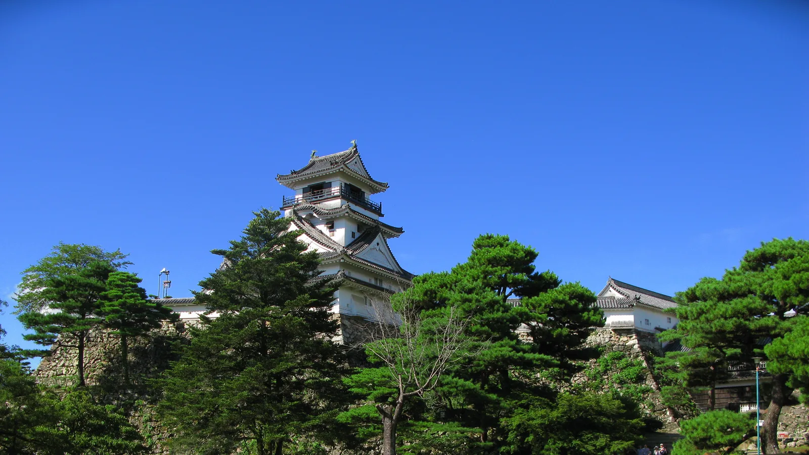 The wooden keep of Kochi Castle, an Edo-period watchtower with a railed gallery running around its top floor