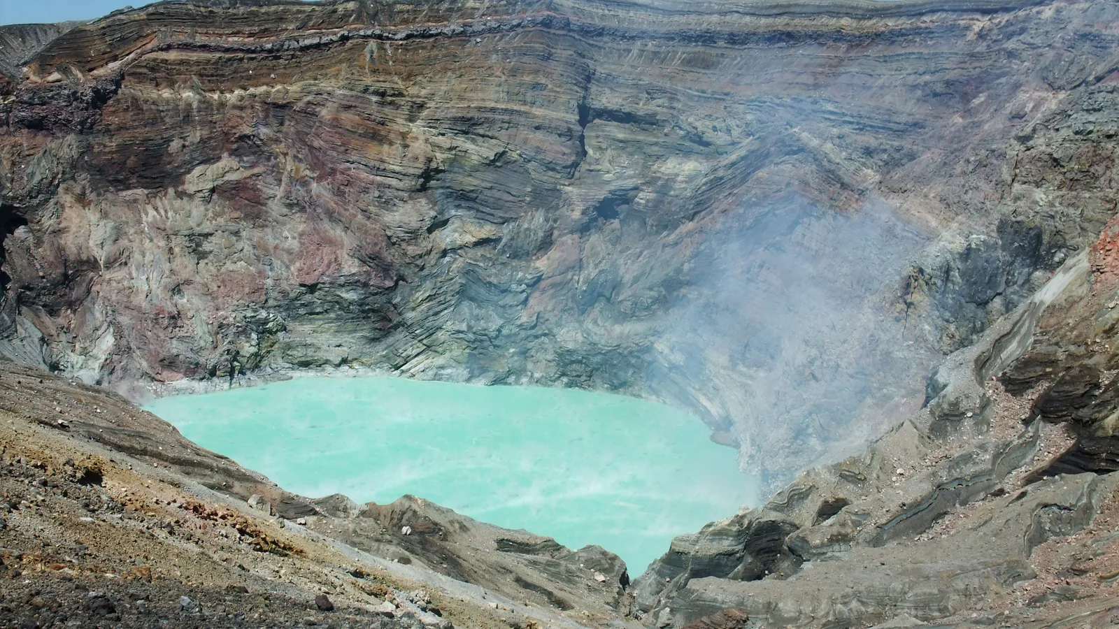 Steam rising from the active Nakadake crater of Mount Aso