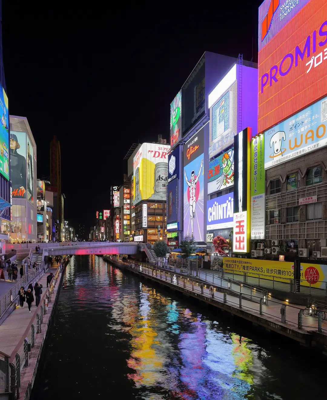 Dotonbori's neon signs reflected in the canal at night, Osaka