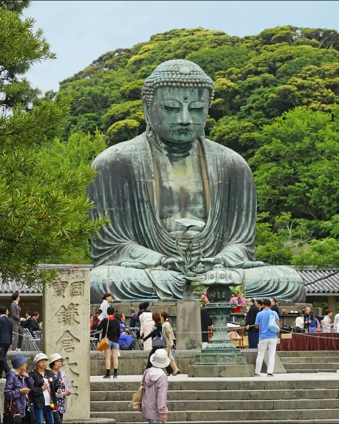 The bronze Great Buddha of Kamakura seated in the open air at Kotoku-in temple