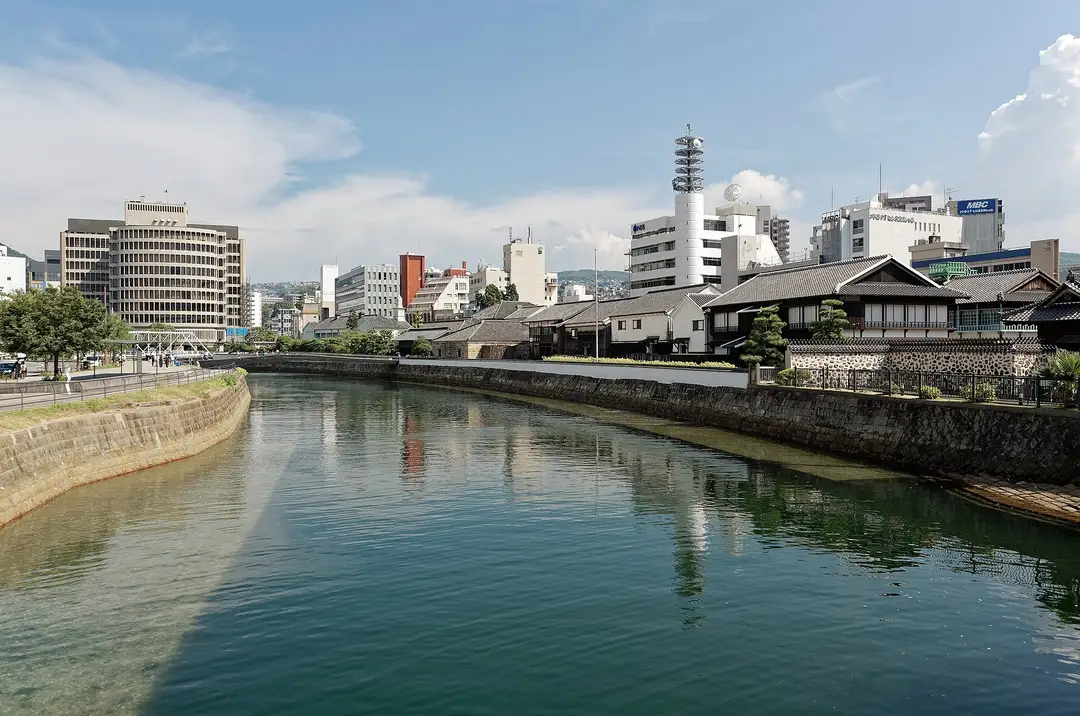 The reconstructed Dejima trading post buildings along the river in Nagasaki